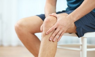 knee arthrosis symptoms